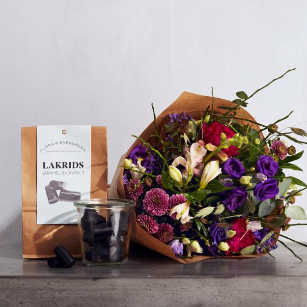 Gavehilsen med lakrids og blomster