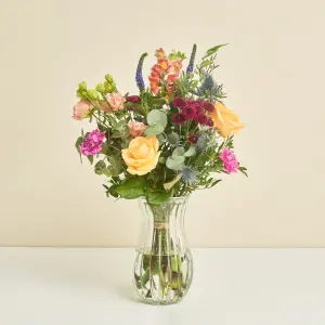 Floristens farverige kondolencebuket
